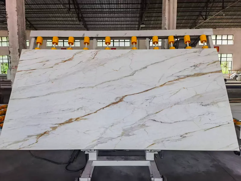 White slab with gold-toned veining on a vacuum lifting frame